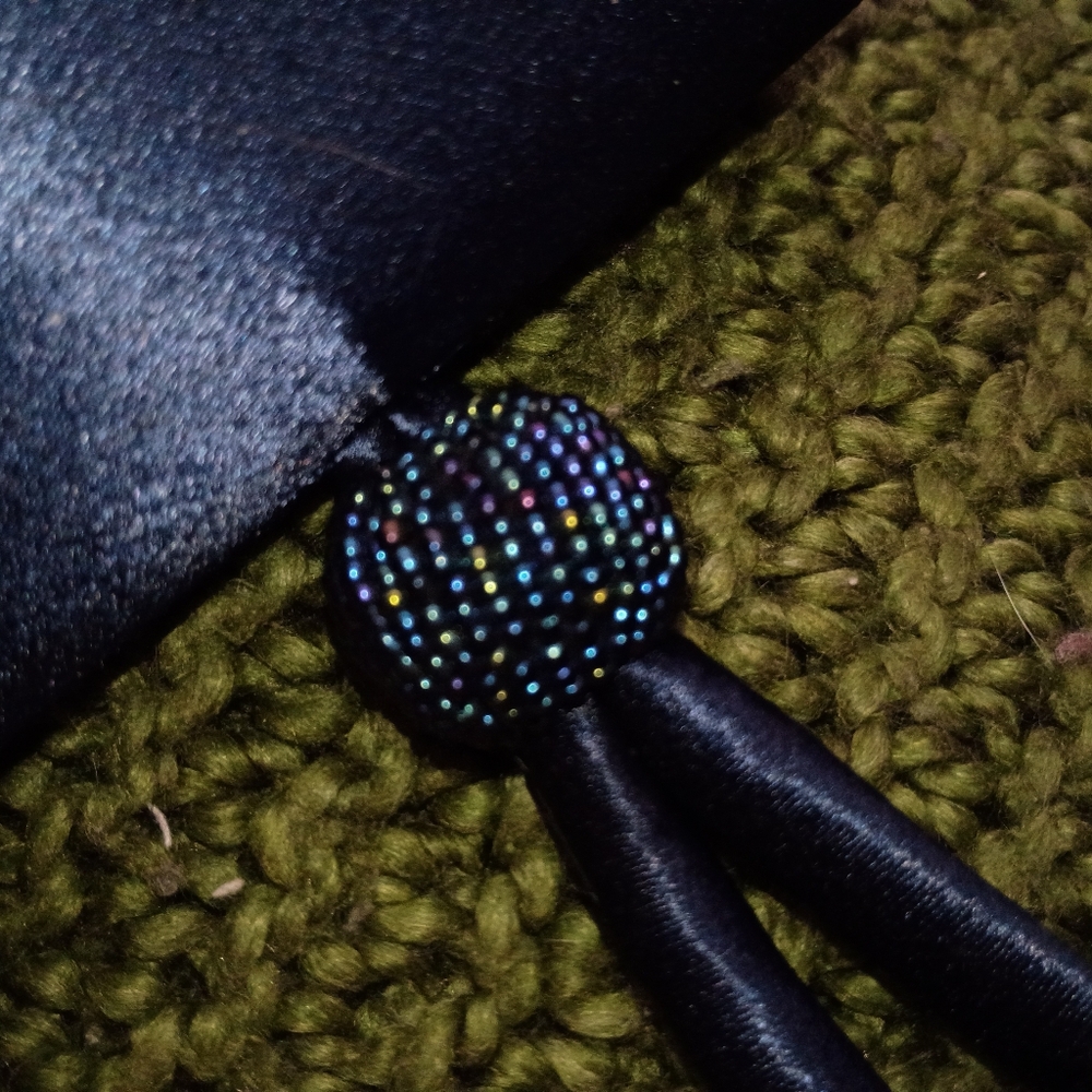 Small clutch purse with beaded detailing